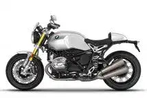 BMW R nineT Sportmotorrad mit silberner Karosserie und goldenen Gabeln.